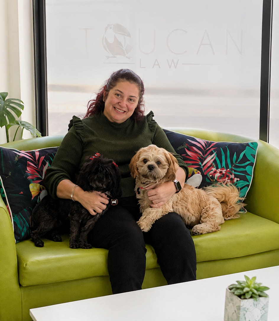 Kylie Cox, founder of Toucan Law, with office dogs Chewie and Wicket